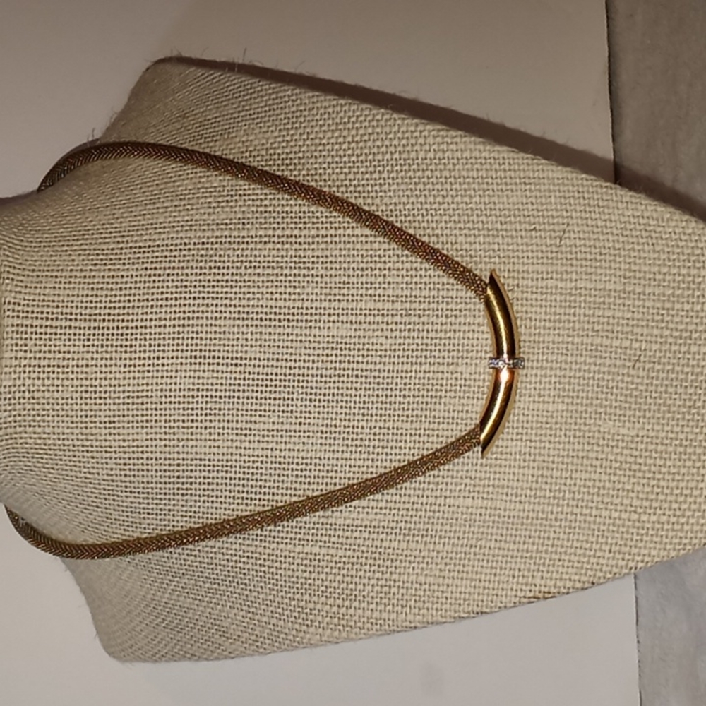 Gold toned vintage Avon mesh becklace with rhinestones